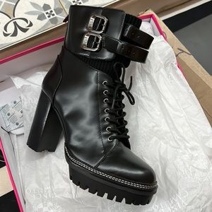 NWT Vince Camuto black combat boot. Never worn!